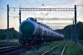 Transport tank car LNG by rail, gas - oil products. LPG transport propane. The fuel train, rolling stock with petrochemical tank Royalty Free Stock Photo