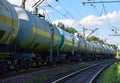 Transport tank car LNG by rail, gas - oil products. LPG transport propane. The fuel train, rolling stock with petrochemical tank Royalty Free Stock Photo