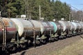 Transport tank car LNG by rail, gas-oil products. LPG transport propane. The fuel train, rolling stock with petrochemical tank