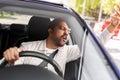 angry indian man or driver driving car Royalty Free Stock Photo