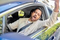 angry indian man or driver driving car Royalty Free Stock Photo