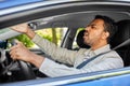 angry indian man or driver driving car Royalty Free Stock Photo