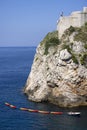 Transportation of colorful kayaks for tourists by water on the Adriatic Sea to the West Harbour, Dubrovnik, Croatia