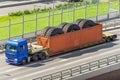 Transportation of huge dump truck wheels in a container on a trailer