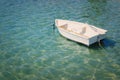 Transportation image of little white boat in the beautiful sea