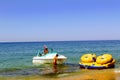 Transportation of an inflatable raft for water entertainment with the help of a motorboat