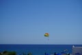 Parasailing in the Mediterranean. Parasailing is a recreational kiting activity where a person is towed behind a vehicle. Rhodes Royalty Free Stock Photo