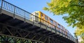 Transportation means. Yellow electric train, Berlin, Kreuzberg east side, Germany. Under view Royalty Free Stock Photo