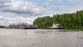 Transportation of oversized cargo on the Volkhov River. Royalty Free Stock Photo