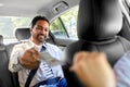 happy man giving money to taxi car driver Royalty Free Stock Photo