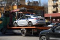 Transportation of a police car on a tow truck
