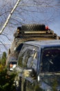 Transportation, powerful motor and driving concept. Two cars covered with mud drops on nature background. Off road