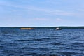 Transportation of timber along the river by barge and tug Royalty Free Stock Photo