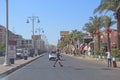 Transportation and traffic on highway in Hurghada city. City with street cars