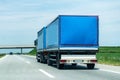 Transportation Truck on country highway under blue sky Royalty Free Stock Photo