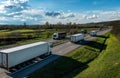 Transportation Trucks in lines passing Royalty Free Stock Photo