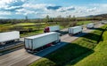 Transportation Trucks in lines passing Royalty Free Stock Photo