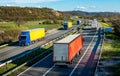 Transportation Trucks in lines passing Royalty Free Stock Photo