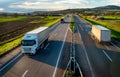 Transportation Trucks in lines passing Royalty Free Stock Photo