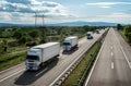 Transportation trucks passing by on asphalt highway Royalty Free Stock Photo