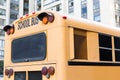 Close up of american schoolbus on city street Royalty Free Stock Photo