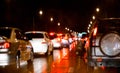 Blurred traffic jam on express way and car brake light in bangkok, thailand on night and copy space Royalty Free Stock Photo