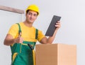 Transportation worker delivering boxes to house