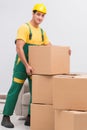 Transportation worker delivering boxes to house Royalty Free Stock Photo