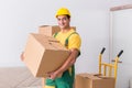 The transportation worker delivering boxes to house Royalty Free Stock Photo