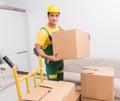 Transportation worker delivering boxes to house Royalty Free Stock Photo