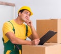 Transportation worker delivering boxes to house