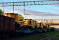 Transporting combine harvesters by rail.