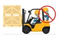 Transporting people on the forklift is prohibited. Fork lift truck transporting a wooden box packing pallet. Work accident in a