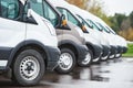 Transporting service company. commercial delivery vans in row