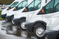 Transporting service company. commercial delivery vans in row