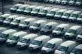 Transporting service companys fleet, delivery vans neatly parked Royalty Free Stock Photo