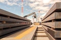 Transshipment terminal for loading steel products to sea vessels using shore cranes and special equipment in Port Pecem, Brazil,