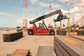 Transshipment terminal for loading steel products to sea vessels using shore cranes and special equipment in Port Pecem, Brazil, Royalty Free Stock Photo