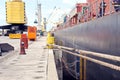 Transshipment terminal for loading steel products to sea vessels using shore cranes and special equipment in Port Pecem, Brazil, Royalty Free Stock Photo