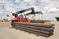 Transshipment terminal for loading steel products to sea vessels using shore cranes and special equipment in Port Pecem, Brazil,