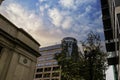 The TransUnion buildings next to Chicago Union Station and apartments with balconies, lush green trees and tall black light posts Royalty Free Stock Photo