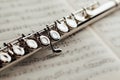 Transverse flute on music sheet Royalty Free Stock Photo