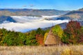 Transylvania landscape in autumn time with low clouds and frost in the morning Romania