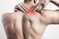 Trapezius muscle pain, muscular man showing injury pan in shoulder muscle or levator muscle Royalty Free Stock Photo