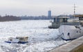 Trapped boat into the frozen Danube river