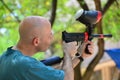 Trarget practice with a paintball gun Royalty Free Stock Photo