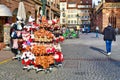 Strasbourg, France - Racks with Alsace region souvenirs like plush storks or gingerbread men