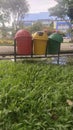 Trash bins are located in a park, so that visitors do not throw rubbish carelessly Royalty Free Stock Photo