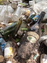 Trash bottles scattered about an eyesore