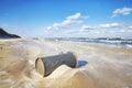 Trash can on a beach, environmental pollution concept Royalty Free Stock Photo